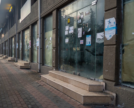 Batumi, Georgia. 21/11/2022 Showcases of the former store. Abandoned business premises. creepy place. Business is bustedのeditorial素材