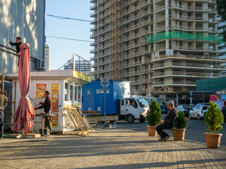 Batumi, Georgia. 11.23.2022 Street scene. People on the street. urban environment. Sidewalk with pedestrians. People's life. Streets of Georgiaのeditorial素材