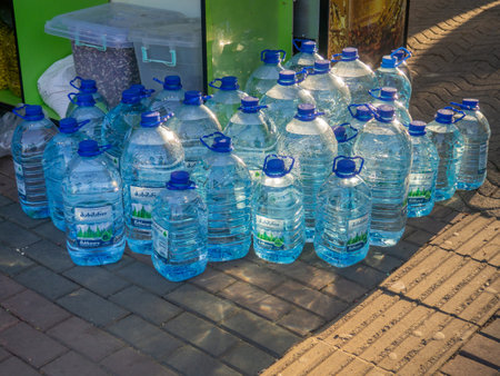 Batumi, Georgia. 23/11/2022 Sale of water in five-liter bottles. hot season. resort water. Lots of plastic bottles outside.のeditorial素材