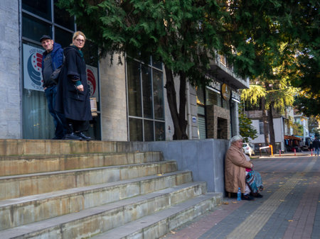 Batumi, Georgia. 11.23.2022 Street scene. people on the street. urban environment. Sidewalk with pedestrians. People's life.のeditorial素材