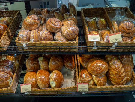 Store shelves. fresh bread. bakery products. Bread in the supermarket in assortmentの写真素材