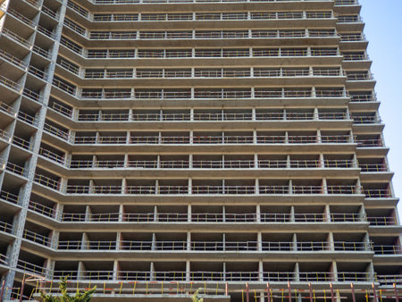 Construction of a modern high house. building frame. Gray concrete structure. unfinished house. Industryの写真素材