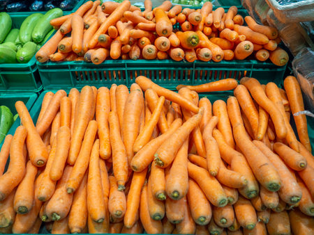 Store shelves. carrot counter. To the grocery store for lunch. assortment in the supermarket. healthy food.の写真素材
