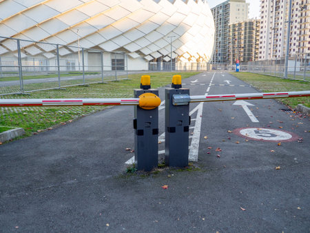 Two electronic barriers. Entrance to the stadium. Pass entry. Fencing for cars. Travel is paid. Paid...