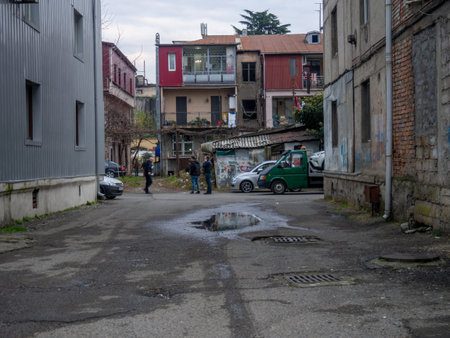 Batumi, Georgia. 12.15.2022 Simple yard to the south. Street in cloudy weather. Yard in Batumi.のeditorial素材