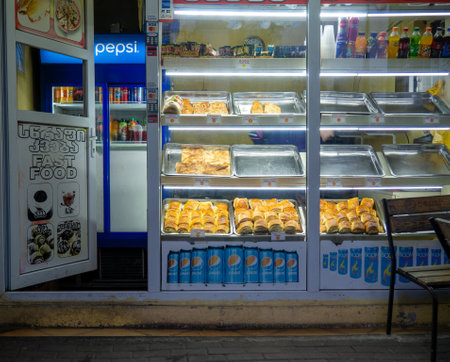 Batumi, Georgia. 12.15.2022 Sales point in Georgia. Street sale of food. Sweets stall. local pastries. fast food point. caloric foodのeditorial素材