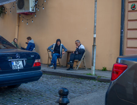 Batumi, Georgia. 12.18.2022 People on the streets of Batumi. People on a walk and rest. Little old streets.のeditorial素材