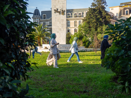 Batumi, Georgia. 12.18.2022 People in Muslim headscarves on the street. Women in hijabs. tourist placeのeditorial素材