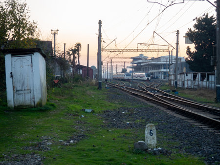 Outdoor wooden toilet at the railway station. transport node. trains. Lots of rails. Waysの写真素材