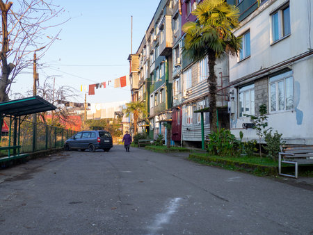 Batumi, Georgia. 12.23.2022 Yard on the outskirts of Batumi. Cozy yard. Old five-story building. soviet architectureのeditorial素材