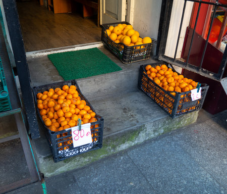 Boxes with madaras at the exit. Sale of tangerines in the market. Citrus boxes. Georgian fruits. local lifeの写真素材