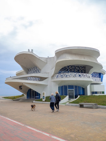 The building of unusual architecture on the seashore. non-working restaurant. resort in winter. Park in Batumi. House on the Black Sea coast. concrete building.の写真素材