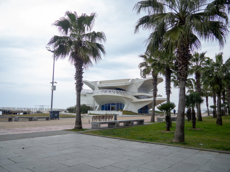 Batumi, Georgia. 01.28.2023 The building of unusual architecture on the seashore. Non-working restaurant. resort in winter. Park in Batumi. House on the Black Sea coast. Concrete building.のeditorial素材
