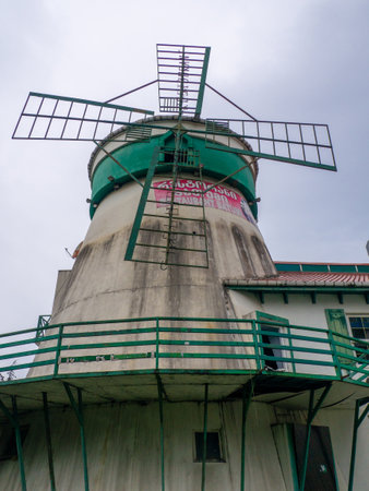 Batumi, Georgia. 01.28.2023 Restaurant in an antique building. The building is in the form of a mill. Batumi architecture. Catering businessのeditorial素材