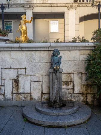 Batumi , Georgia. 02.08.2023 Angel in the square A pedestal with a water tap. Landmark in Batumi. A monument that is rubbed by hand. Piazzaのeditorial素材