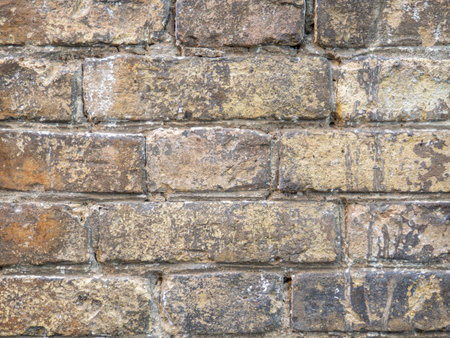 Wall of the old church. Background from brown bricks. Stone pattern. Construction. Old brick layingの写真素材