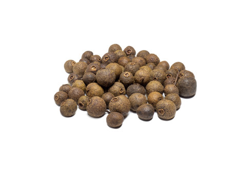 Allspice on a white background. Peppercorn isolate. Seasoning for dishes. Cooking. Allspice Isolate Peasの写真素材