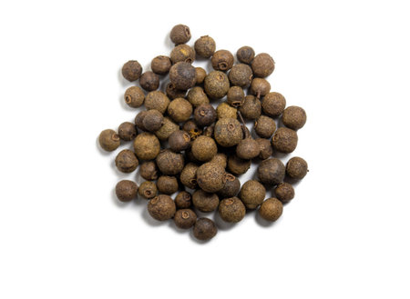 Allspice on a white background. Peppercorn isolate. Seasoning for dishes. Cooking. Allspice Isolate Peasの写真素材
