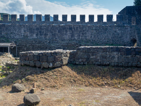 Ruins of an ancient castle. At the archaeological site. Ruined Palace Museum. Fortress Gonio. The architecture of antiquity. Georgiaのeditorial素材