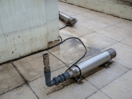 Drained fountain. A device for splashing water in a fountain.  technical device of the fountain. Technology in the park. Repair workの写真素材