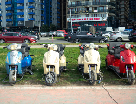 Batumi, Georgia. 03.11.2023 Tricycle in the park. Vehicle for rent. Resort place. Active lifestyleのeditorial素材