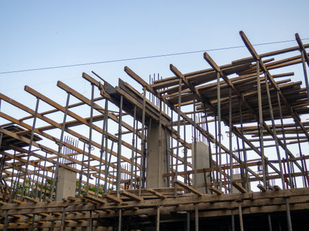 Construction of a new floor. Building a house. Installation of walls and supportsの写真素材
