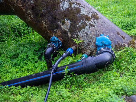 Valves on the gas pipeline. Gas cover. Transportation of fuel through the pipe. Village gas supply. Industry. Export of energy carriers. Embedded new line into old pipeの写真素材