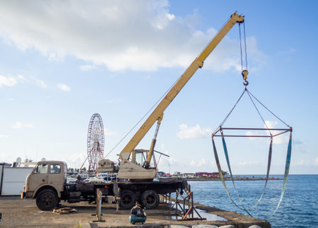 Crane for loading and lifting boats. Transportation of boats. Private boats. Resort place. south seaの写真素材