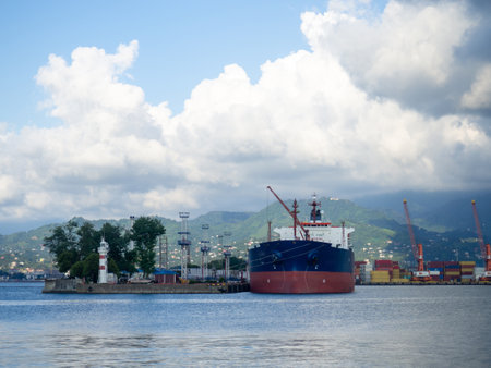 Port on the Black Sea coast. Ships on the pier. Barage in the portの写真素材