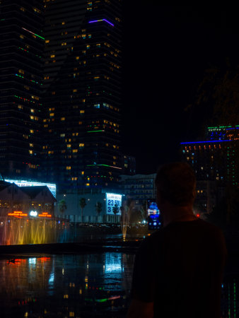 Batumi, Georgia. 08.18.2023 Night city in lights. High-rise buildings at the resort. Just like in...