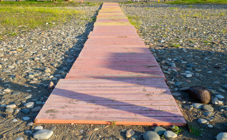 Flooring made of colored boards on the beach. Convenience at the resort. Path to the beach. Coast of the Black Sea.の写真素材