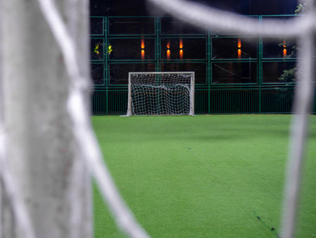 Mini football game concept. Mini football field in the park. infrastructure for sports fans. Healthy lifestyle. Football goal netの写真素材