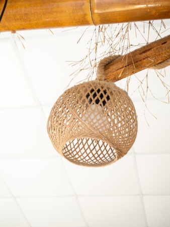 Lighting in a cafe. Interior detail. The lamp does not light up. Lighting device during daylight hours.  Electricityの写真素材