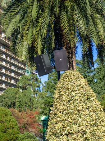 Speakers in the park. Music concept in the park. Technology and nature. Technologies for relaxing holidaysの写真素材
