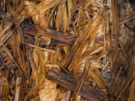 Pressed wood. Wood background. Pattern made of pressed sawdust. Plywood for furniture making