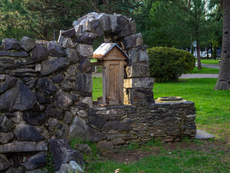 Old wall. Decoration made of stones in the park. Ancient wall.の写真素材