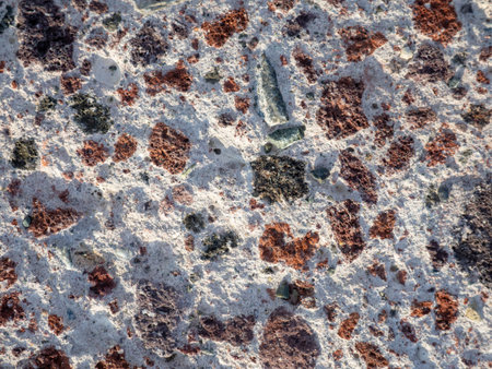 Section of building stone. Structure of concrete. Hard uneven surface. Stone background. Pattern