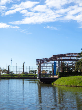 Construction of a restaurant on the shore of the city lake. Reconstruction of the local restaurant building. Famous place in Batumi. Resort place by the sea in winterの写真素材