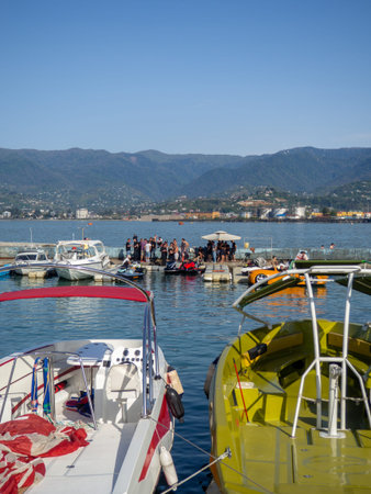 Batumi, Georgia. 04.18.2024 Ships and boats at the pier. Resort port. Boats for rent. Black Sea...