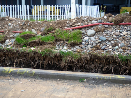 Land works. Reconstruction of the embankment of the resort town. Improvement works. Infrastructure repair.の写真素材