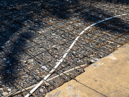 road repair. Reinforcement mesh. Before pouring concrete. Installation of communications. Repairs in the parkの写真素材