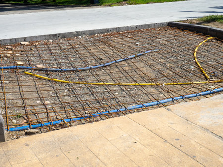 road repair. Reinforcement mesh. Before pouring concrete. Installation of communications. Repairs in the parkの写真素材