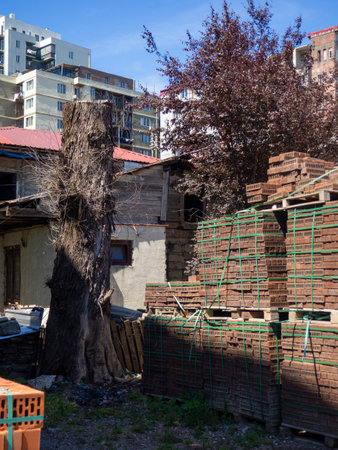 Sale of construction materials on the street. Open air market for building materials. A bunch of bricks in sleepers. Construction preparation conceptの写真素材