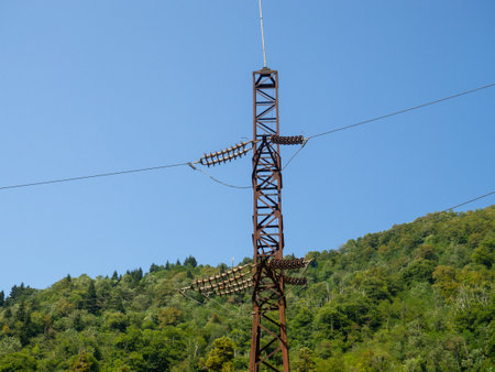 Electricity in the mountains. Electric wires. Industry. Electrical wiring tower.の写真素材