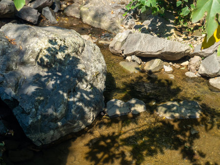 Large boulders in a stream. Mountain river. Nature. Water flowの写真素材
