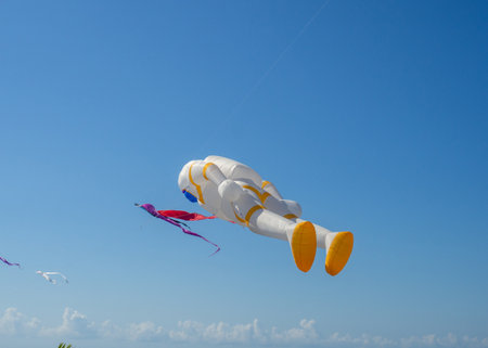Kite Festival. Preparing to launch a kite. Entertainment and hobbies. Windy weather. Resort coastの写真素材