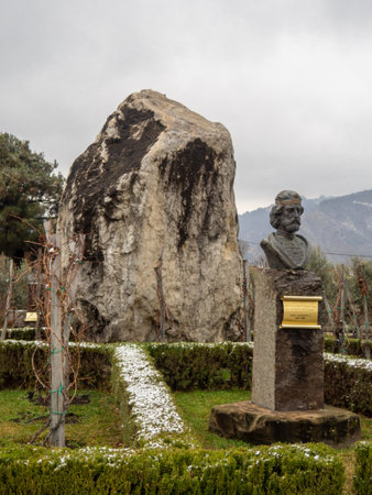 Park in Tbilisi. Monument to a historical figure. Large stone. Park decor. Winter in a park in the Caucasusの写真素材
