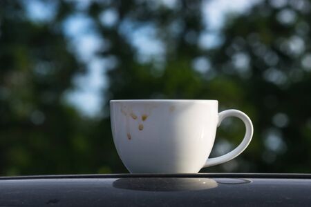 White coffee cup in the morning before going to work.の写真素材