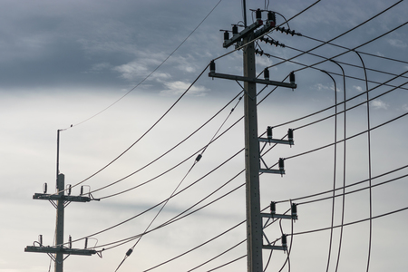 High voltage electric poles in urban areas.の写真素材