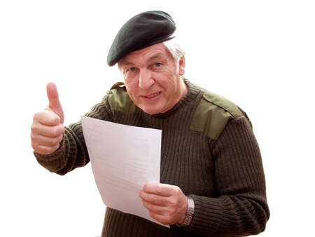 Veteran giving the thumbs up to a letterの写真素材